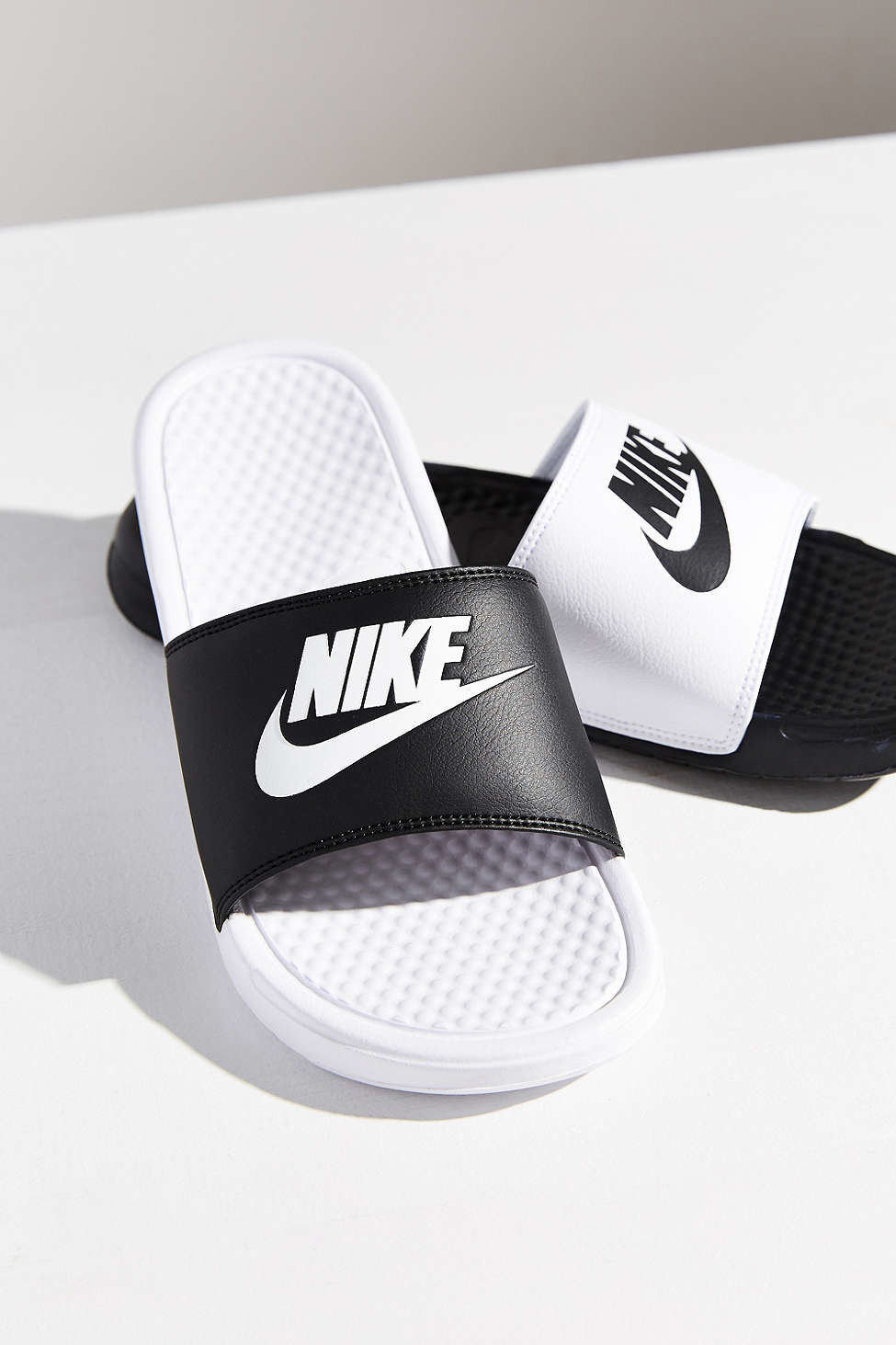 women's nike benassi slides black and white